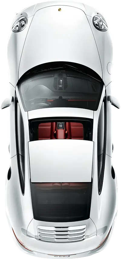 Overhead view of a sleek white Porsche 911 Turbo S with a panoramic sunroof and red leather interior.